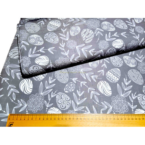 látka s teflónovou úpravou na obrusy štóly behúne s veľkonočným motívom bielych kraslíc na šedom podklade, margo metráž